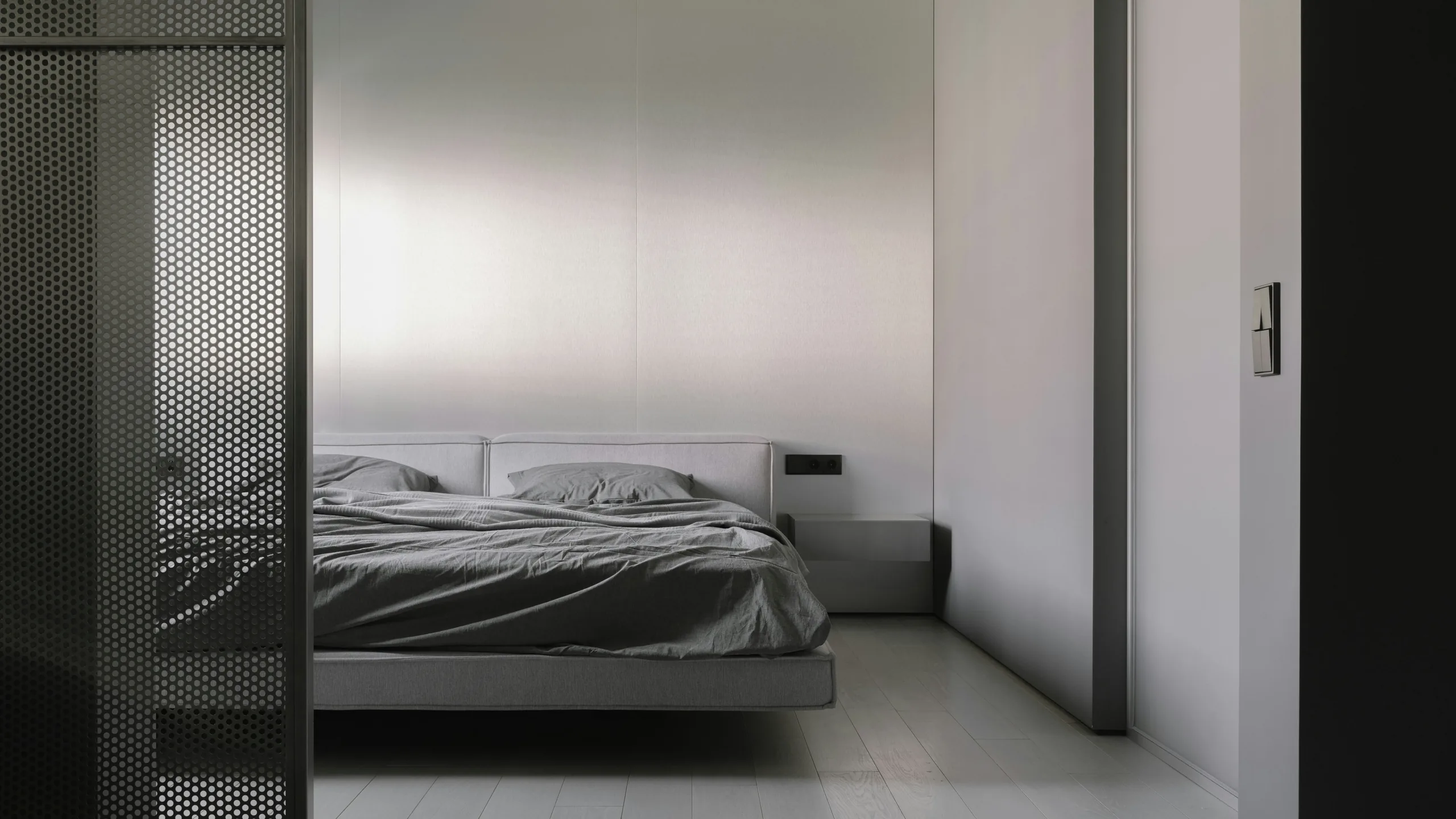 A warm, considered bedroom